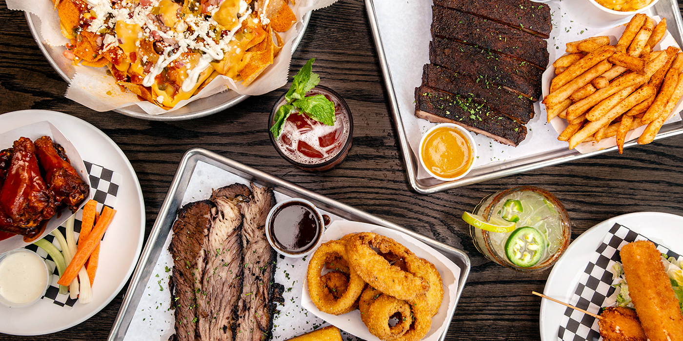 Spread of dinner food menu items at the Piggy Bank